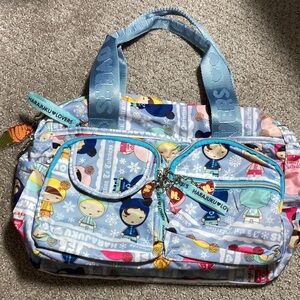 Harajuku Lovers eskimo kisses rare print heart zipper pulls purse